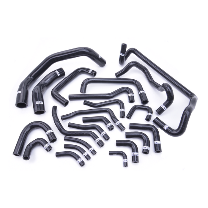 A set of black silicone hoses of various shapes and sizes, intended for use in a Nissan R32 GTR RB26 engine.
