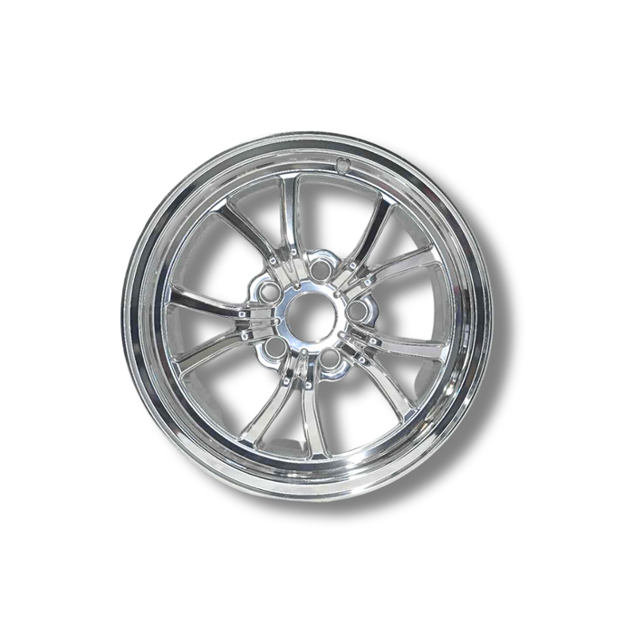 Chrome car wheel rim on a white background