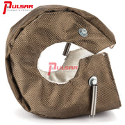 A Pulsar Turbos branded turbo blanket designed to cover a turbocharger, primarily made of metal with a rock-like appearance, displayed alongside metal components presumably for attachment or installation.