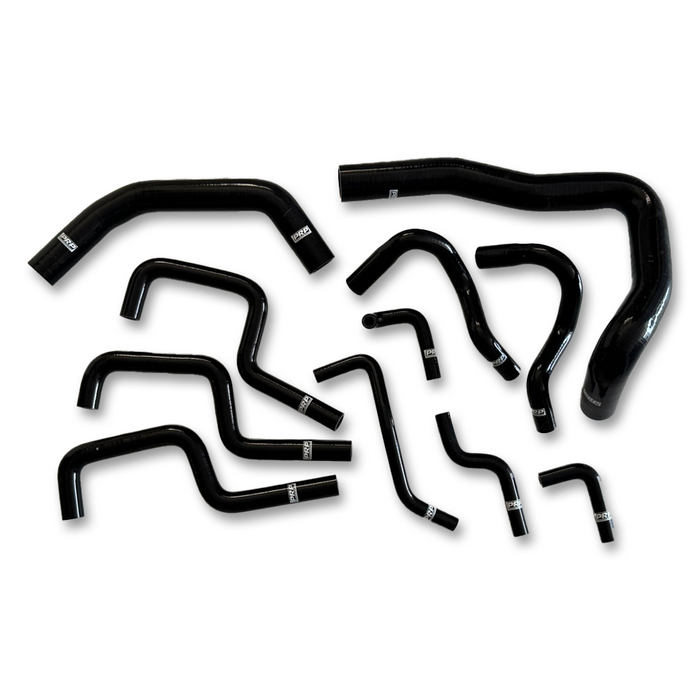 A set of black silicone hoses of various shapes and sizes, designed for a Holden Commodore VL RB30 engine.